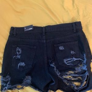 Black ripped denim shorts